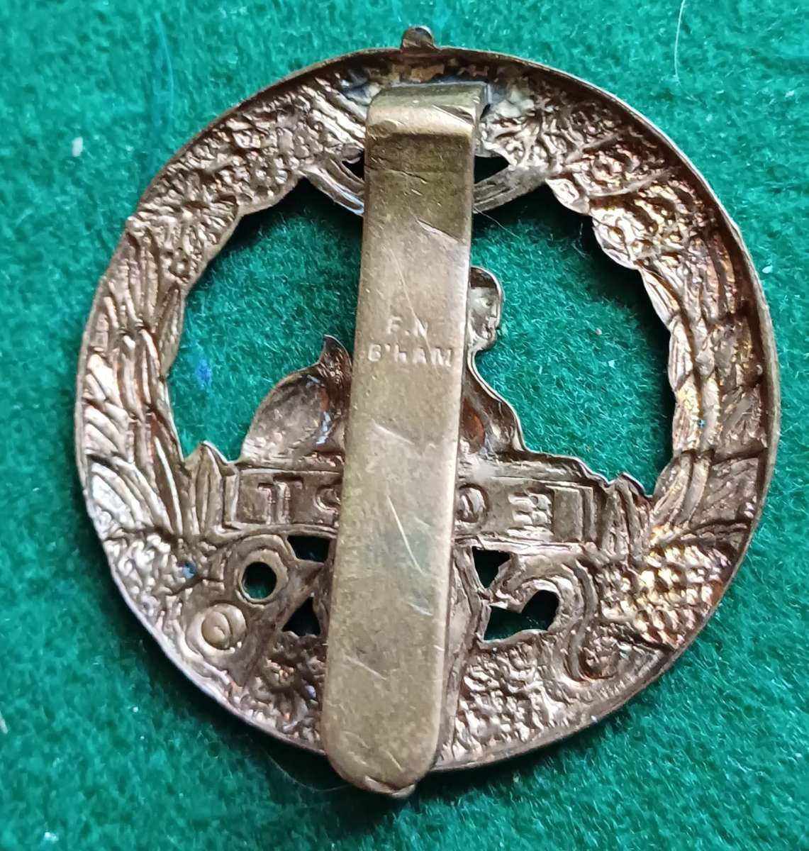 British Army, South Wales Borderers brass cap badge, scarce FN makers mark