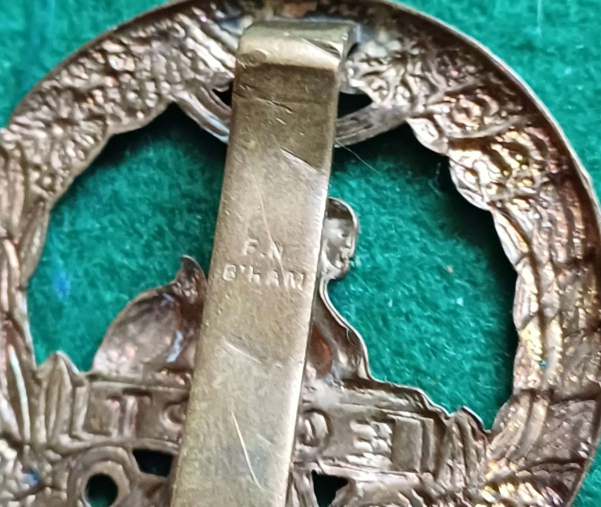 British Army, South Wales Borderers brass cap badge, scarce FN makers mark