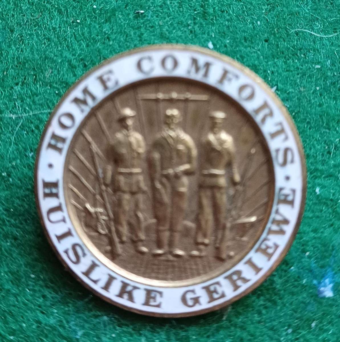 SA UDF WWII, Home Comforts brass and enamel pin badge.