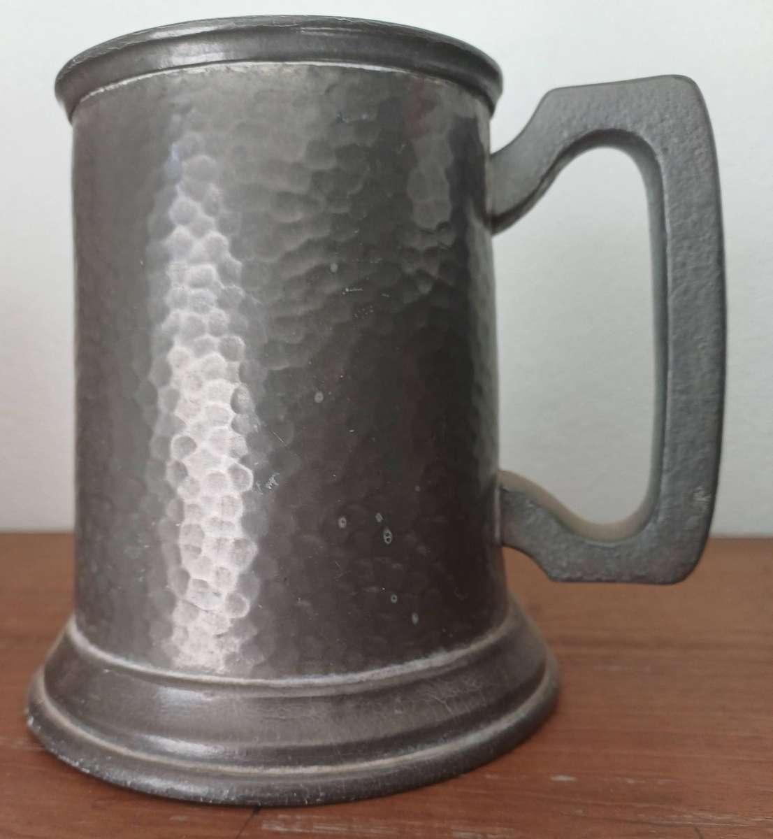 Pewter mug with glass bottom