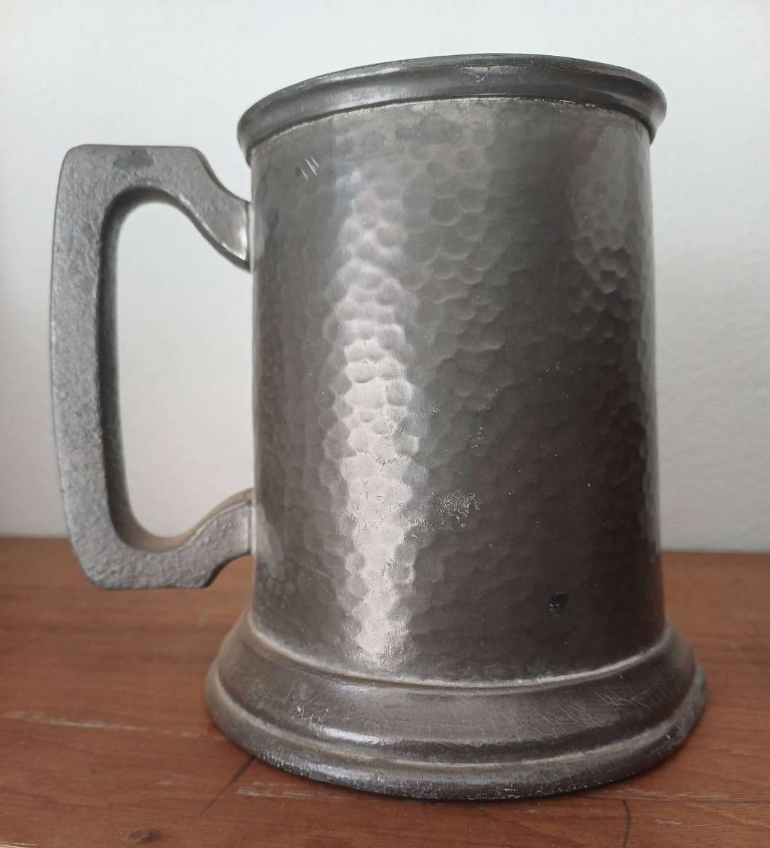 Pewter mug with glass bottom