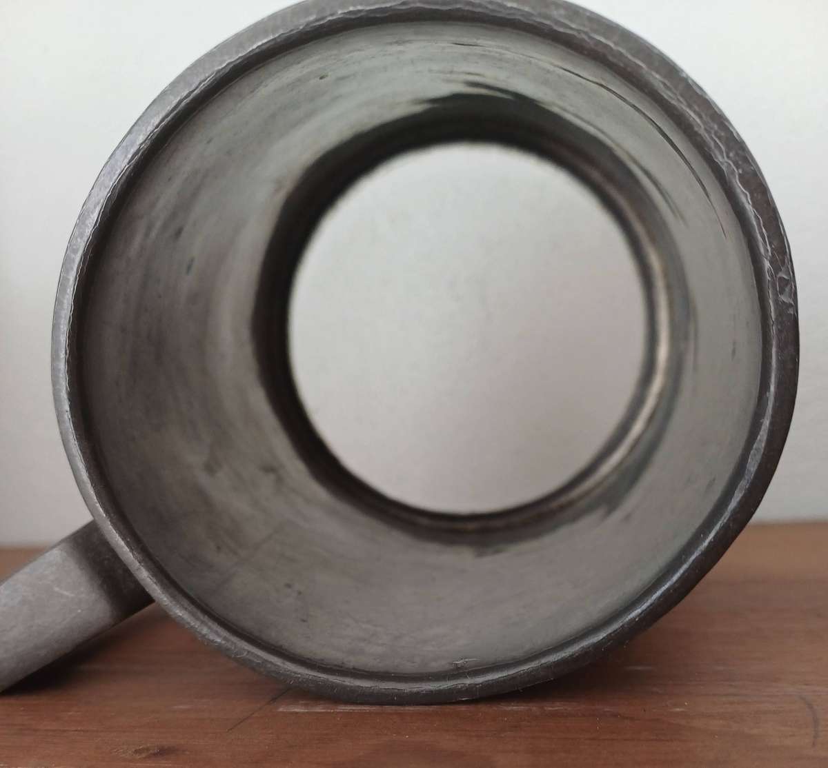 Pewter mug with glass bottom