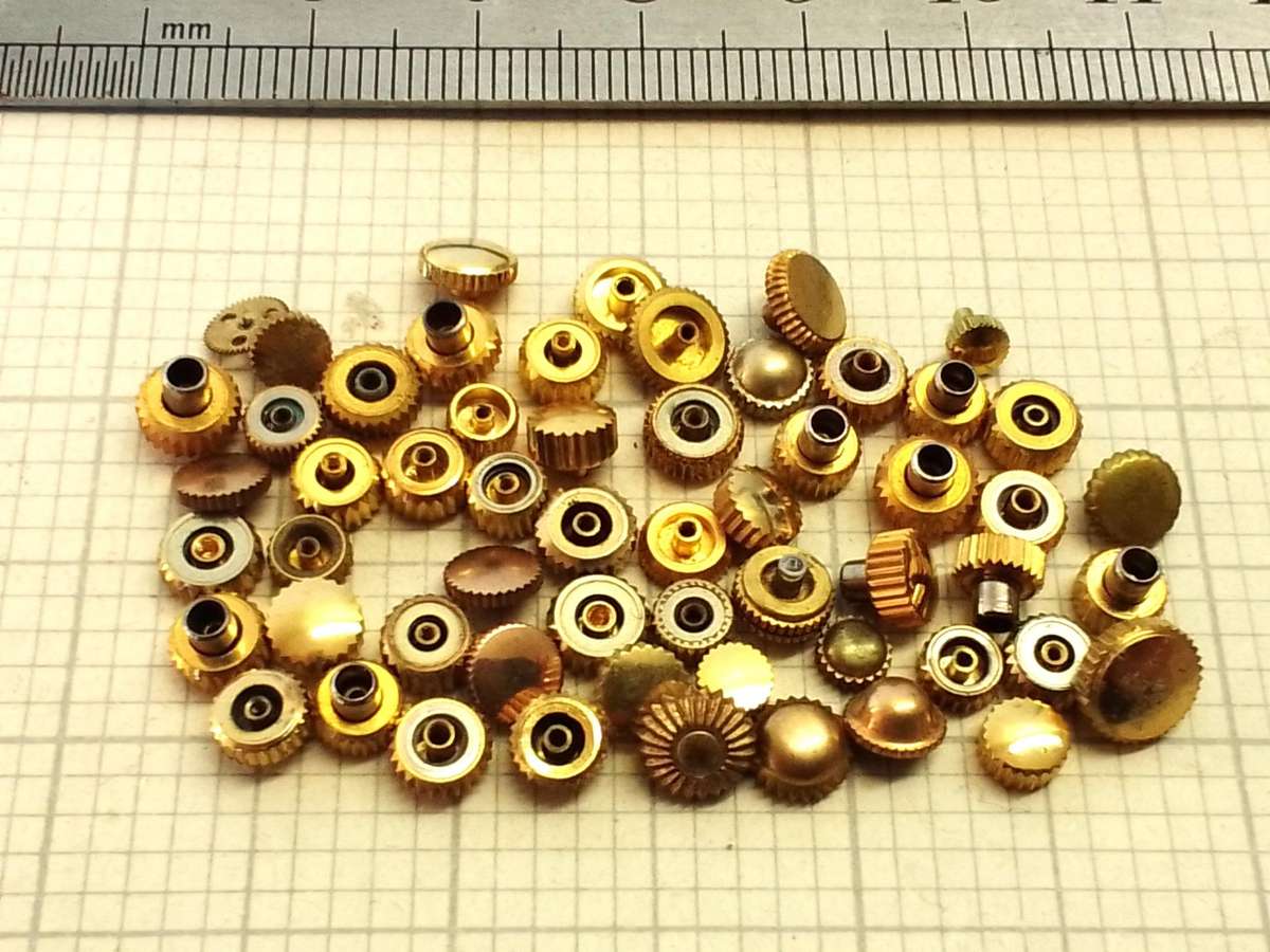 Assorted gold watch crowns - 50+ pieces