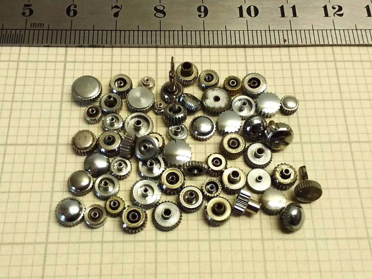 Assorted stainless steel watch crowns - 50+ pieces