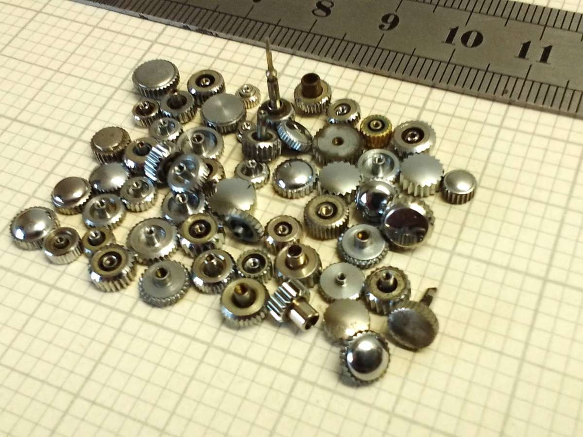 Assorted stainless steel watch crowns - 50+ pieces
