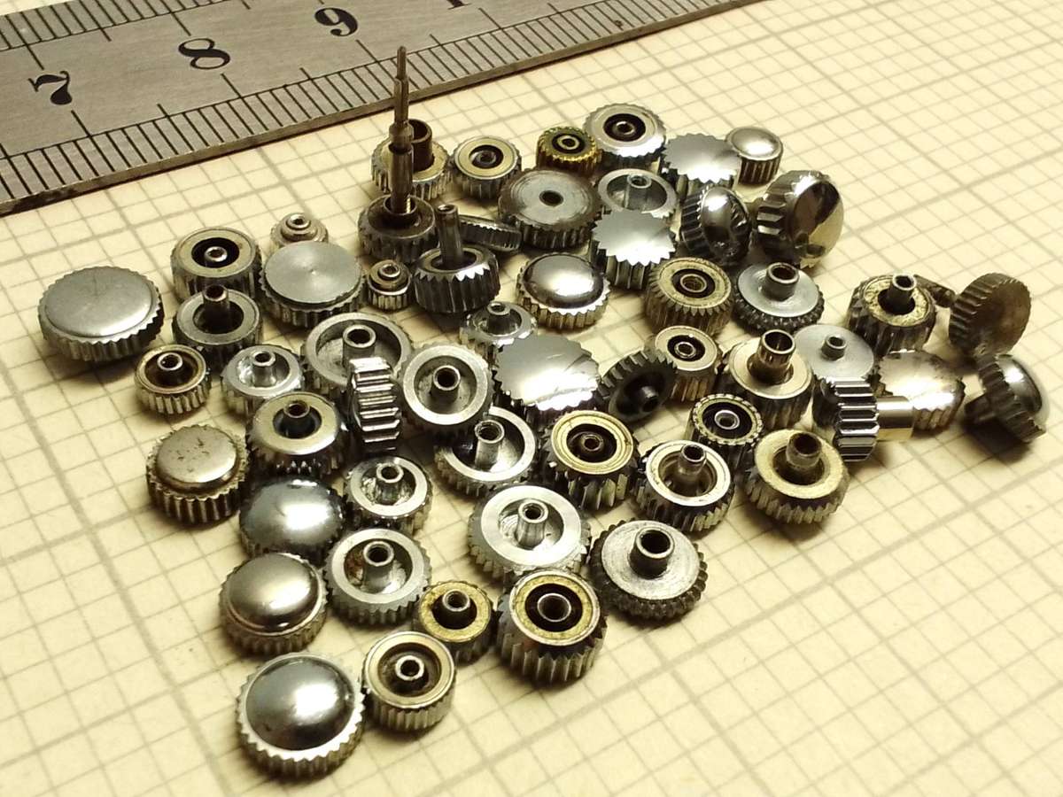 Assorted stainless steel watch crowns - 50+ pieces