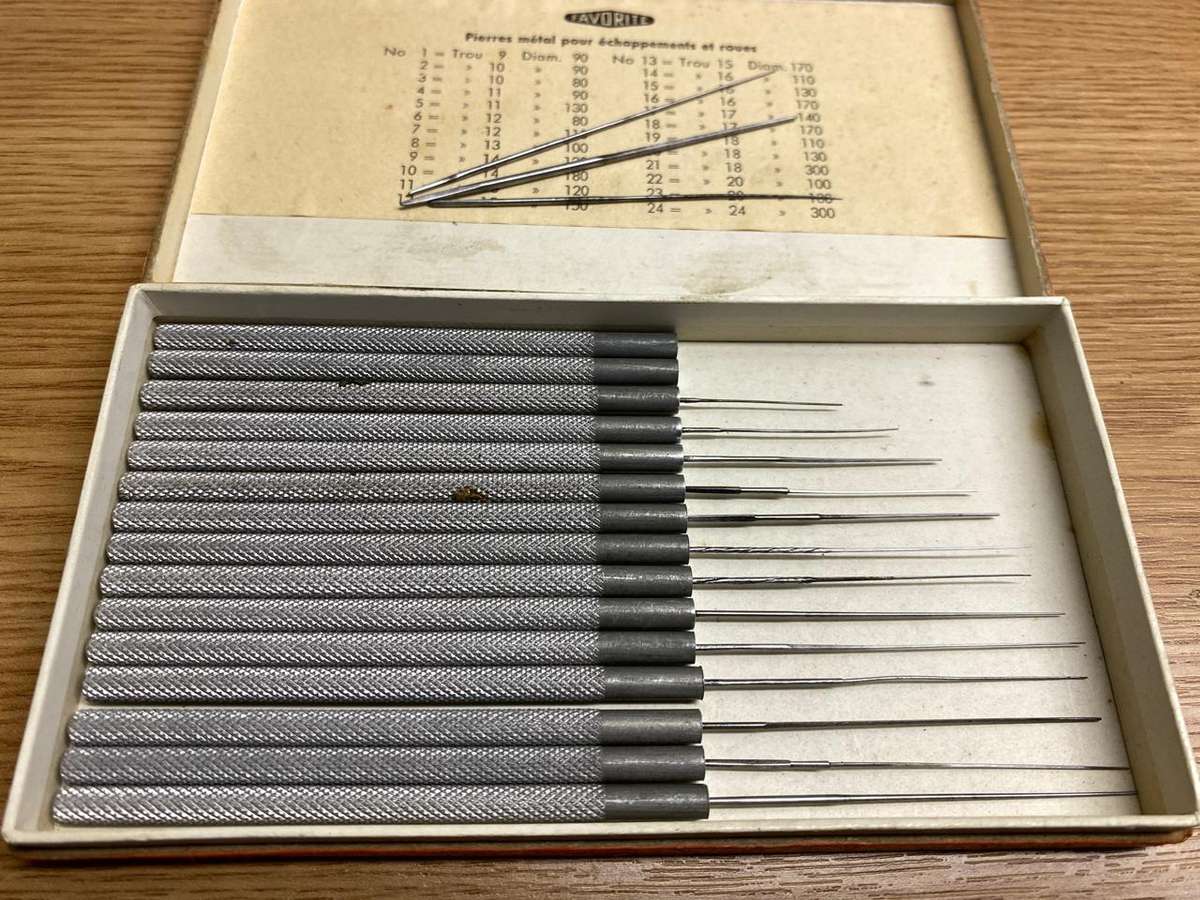 Watchmakers/jewelers cutting & smoothing broaches