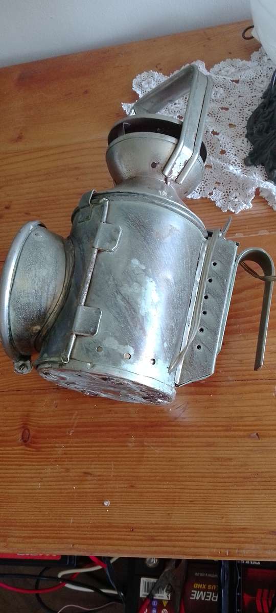 An antique shunters lamp electrified