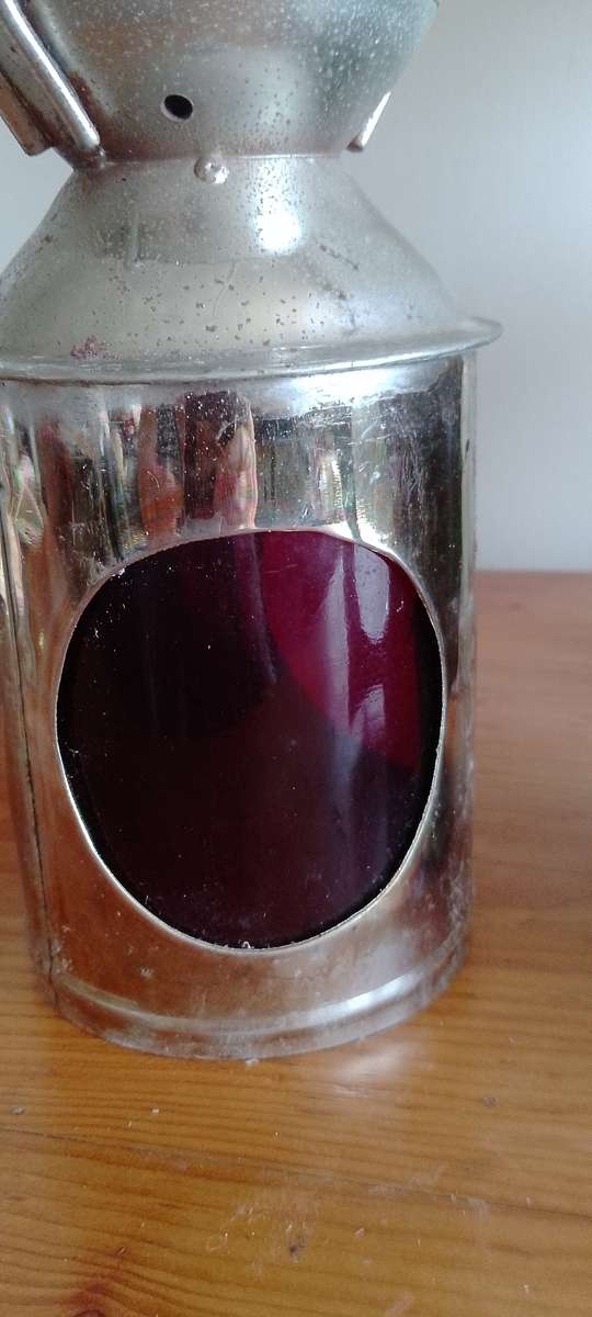 An antique shunters lamp electrified