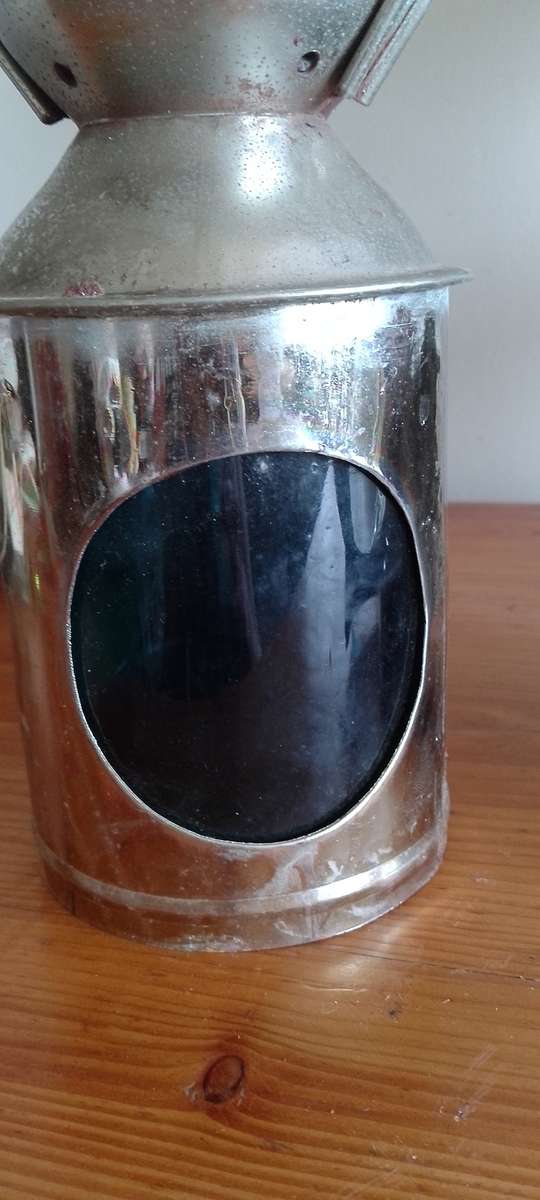 An antique shunters lamp electrified