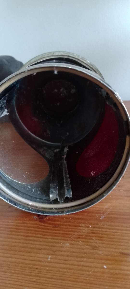 An antique shunters lamp electrified