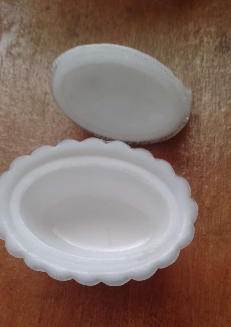 A VINTAGE MINATURE MILK GLASS CHICKEN NEST