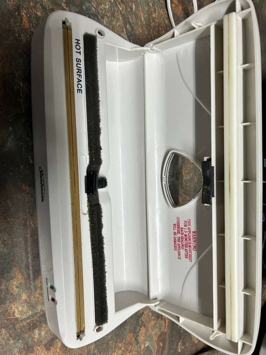 Sunbeam electronic vacuum bag sealer - Faulty hinge