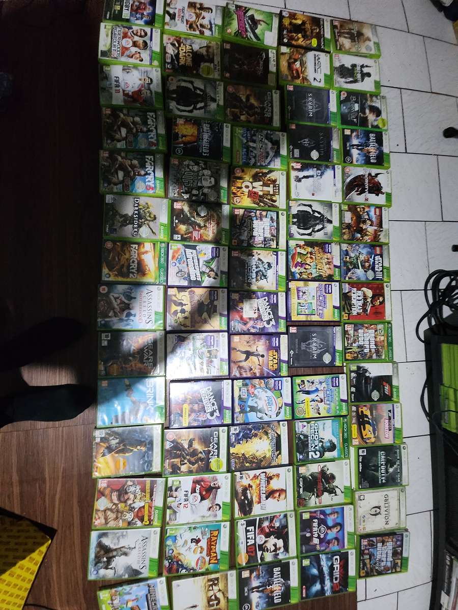 Xbox 360 with 1 control and 3 games