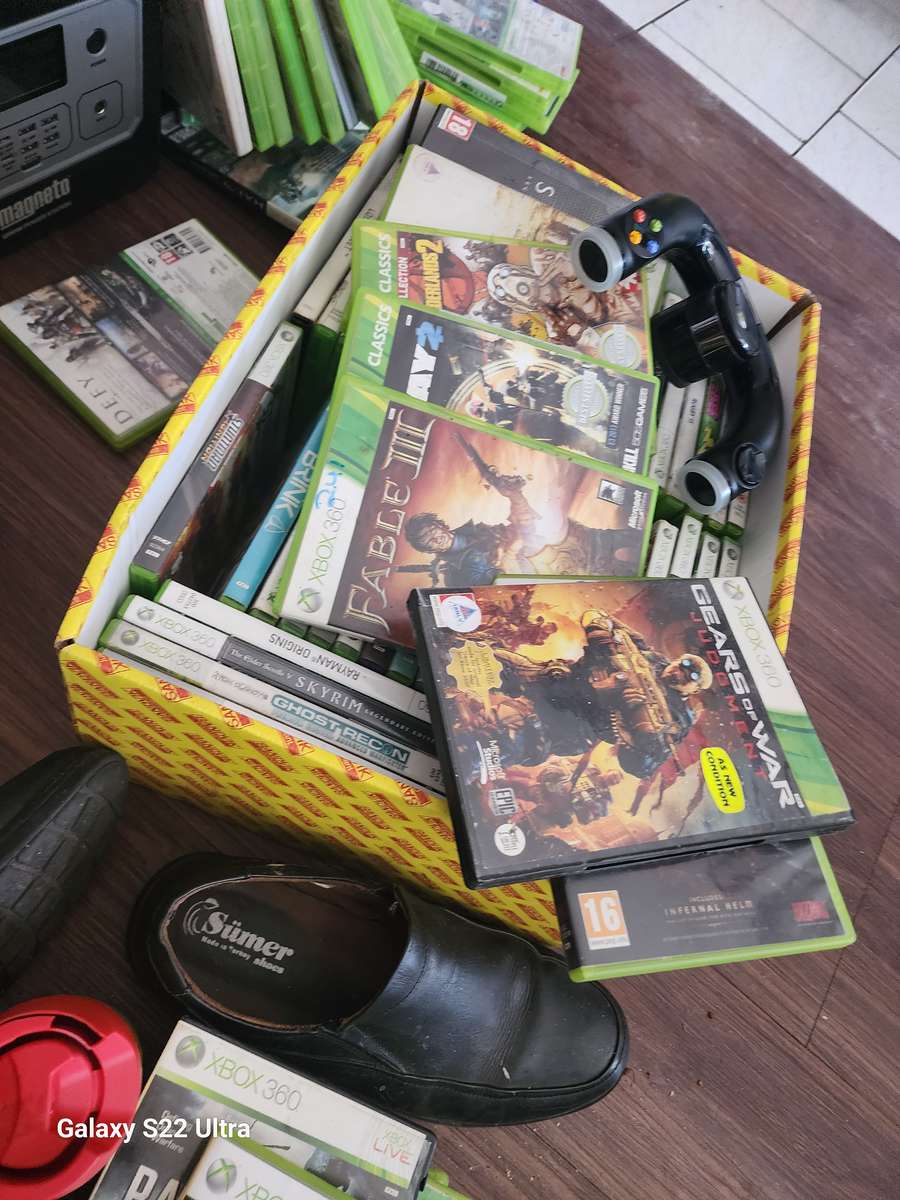 Xbox one s with 2 controls and 3 games of your choice