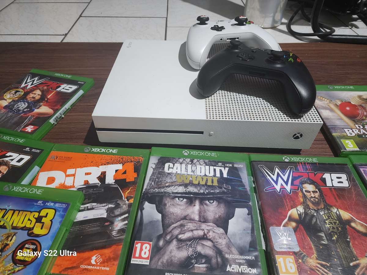 Xbox one s with 2 controls and 3 games of your choice
