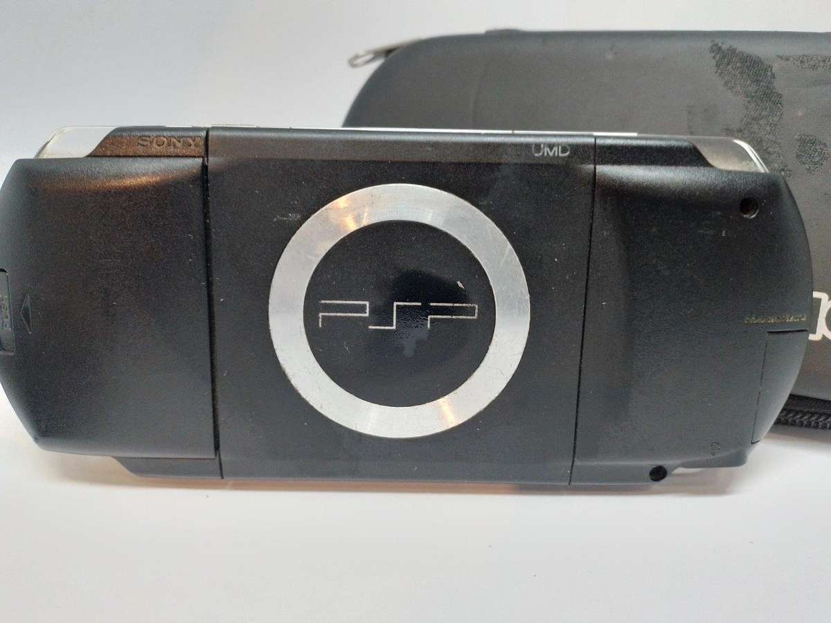 PSP 1000,  Charger, Carry Case, no memory Card