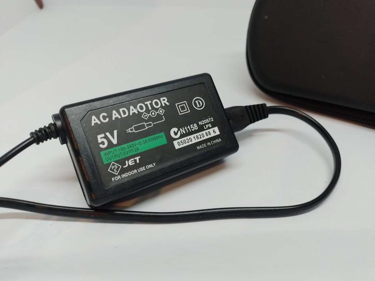 PSP 1000,  Charger, Carry Case, no memory Card