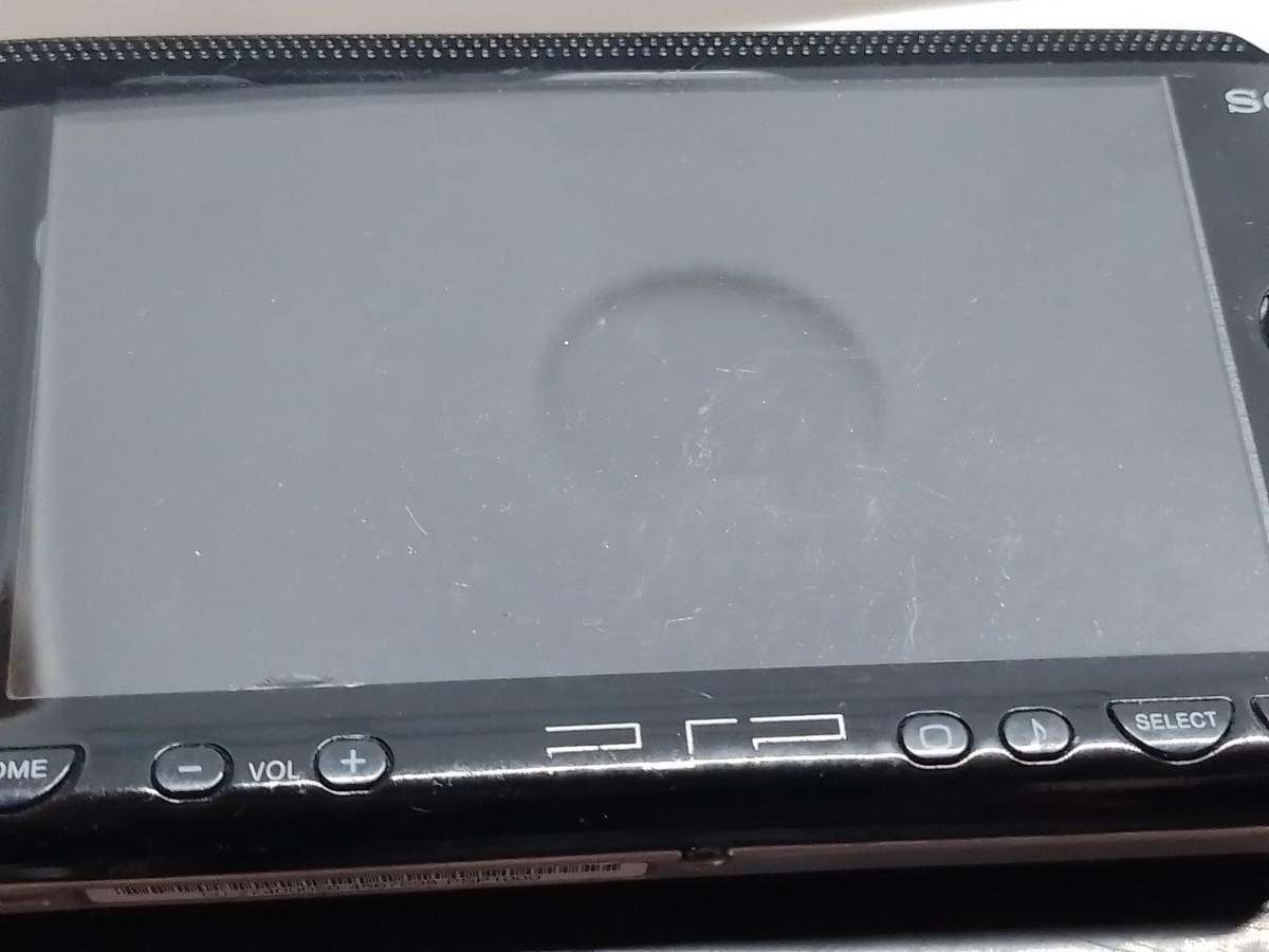 PSP 1000,  Charger, Carry Case, no memory Card