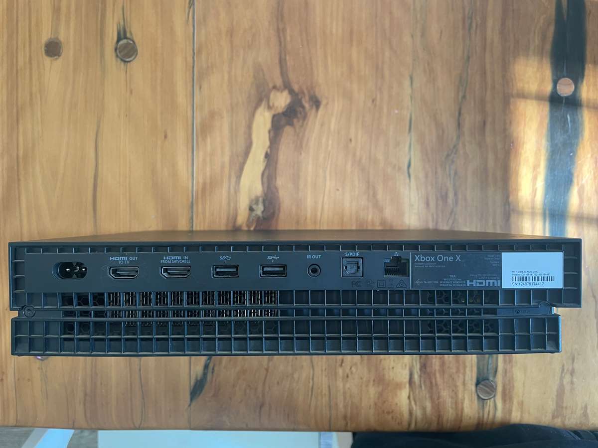 Xbox One X 1TB with controller and 6 games