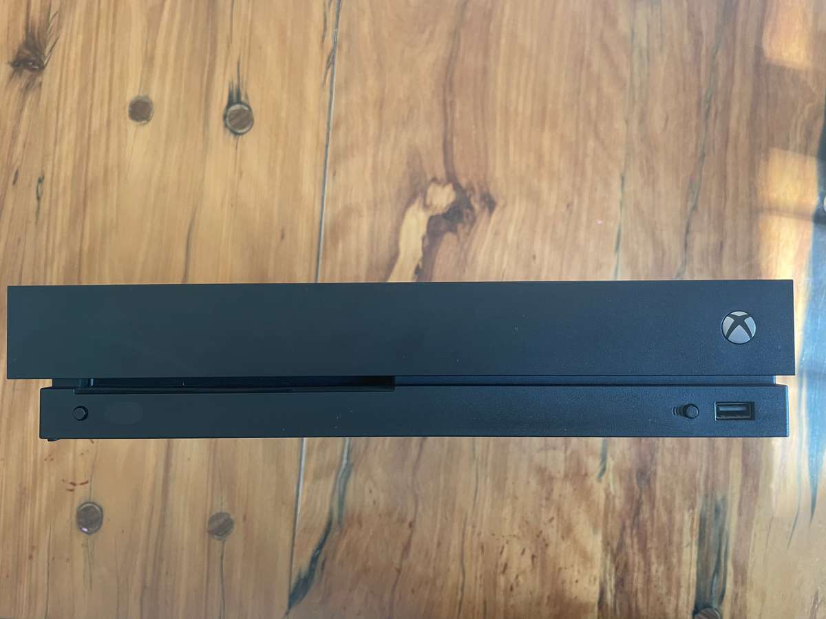 Xbox One X 1TB with controller and 6 games