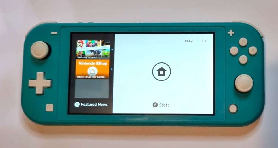 Mint Condition Turquoise Nintendo Switch Lite Bundle