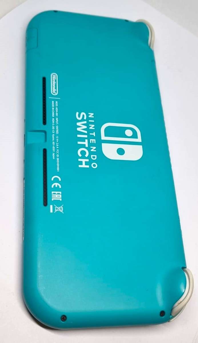 Mint Condition Turquoise Nintendo Switch Lite Bundle