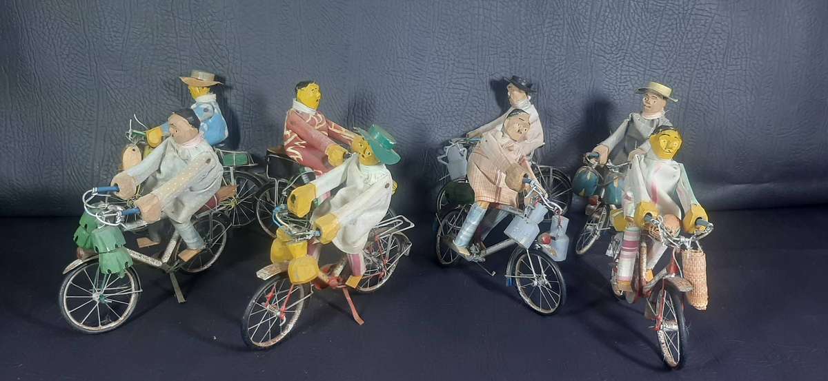HANDMADE VINTAGE CYCLIST FIGURES  SET OF 8