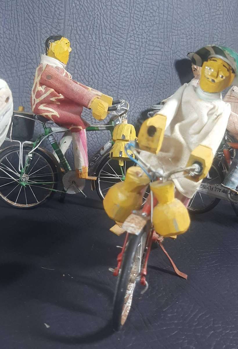 HANDMADE VINTAGE CYCLIST FIGURES  SET OF 8
