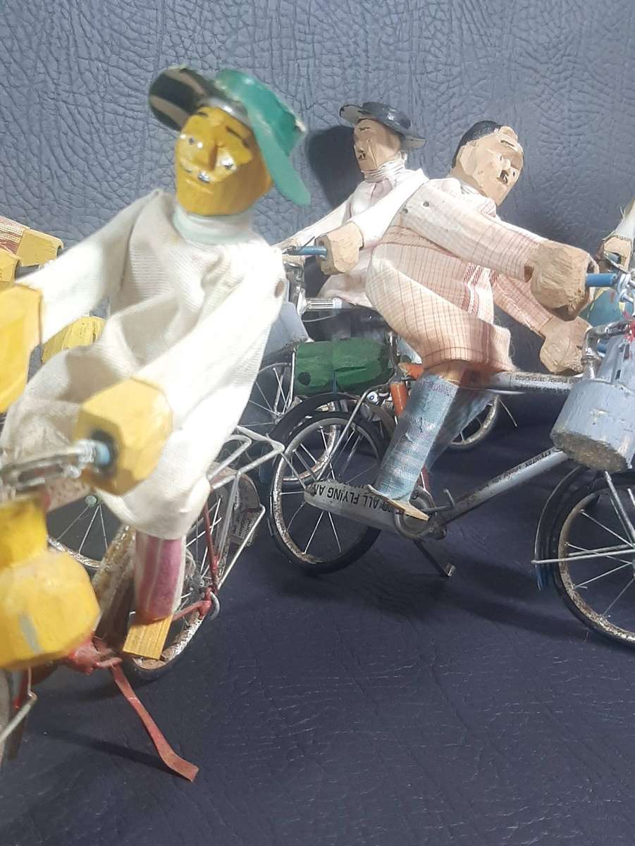 HANDMADE VINTAGE CYCLIST FIGURES  SET OF 8