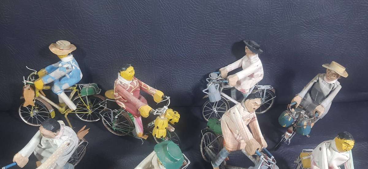 HANDMADE VINTAGE CYCLIST FIGURES  SET OF 8