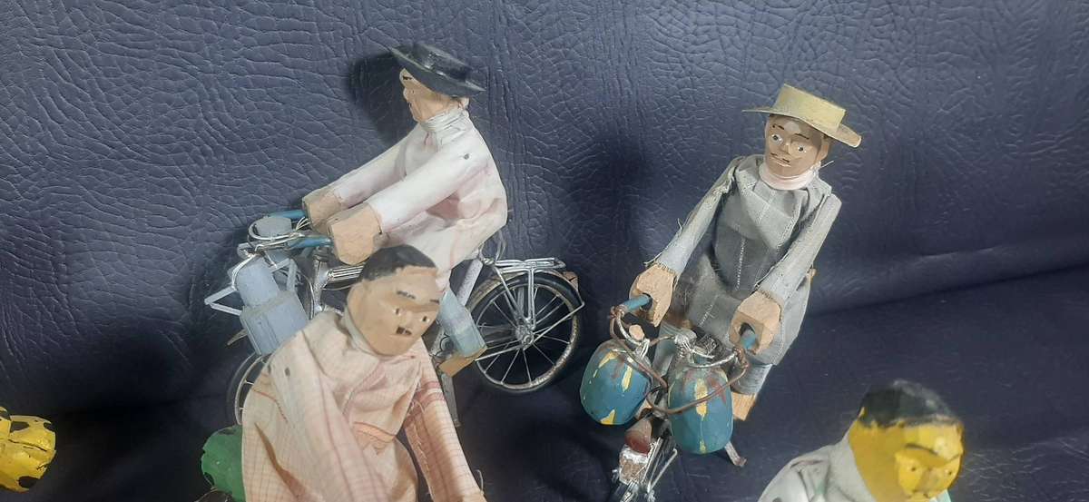 HANDMADE VINTAGE CYCLIST FIGURES  SET OF 8