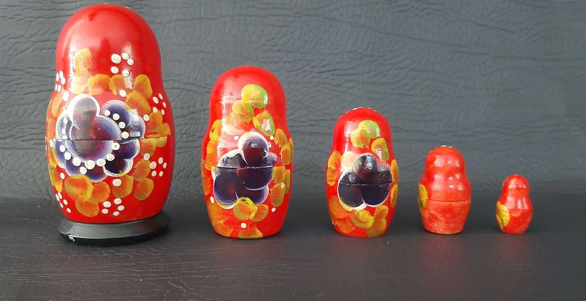 TWO VINTAGE BABUSHKA DOLL SETS  8 HAND-PAINTED NESTING TREASURES