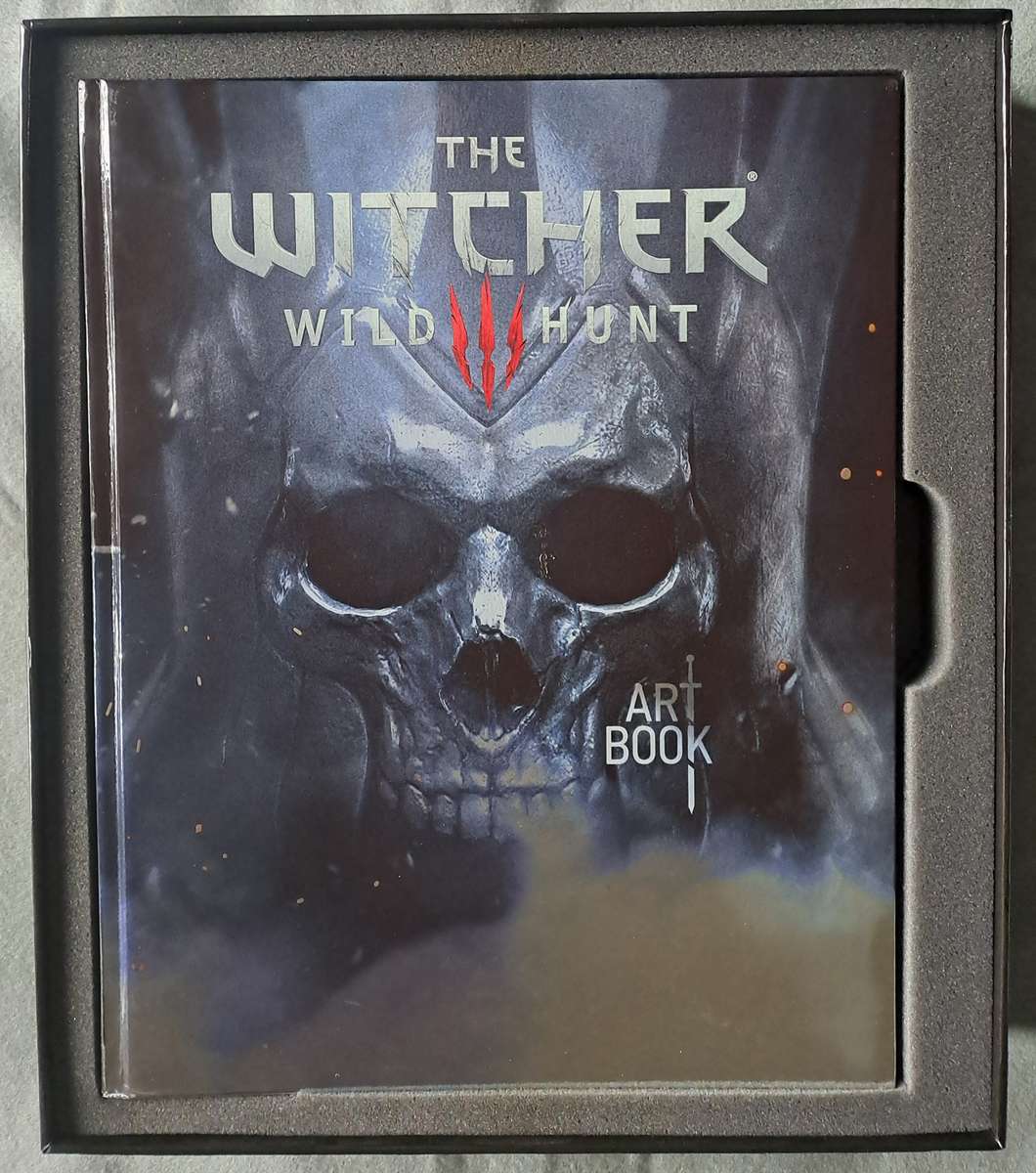 The Witcher 3 wild hunt collector's edition art book and strategy guide.