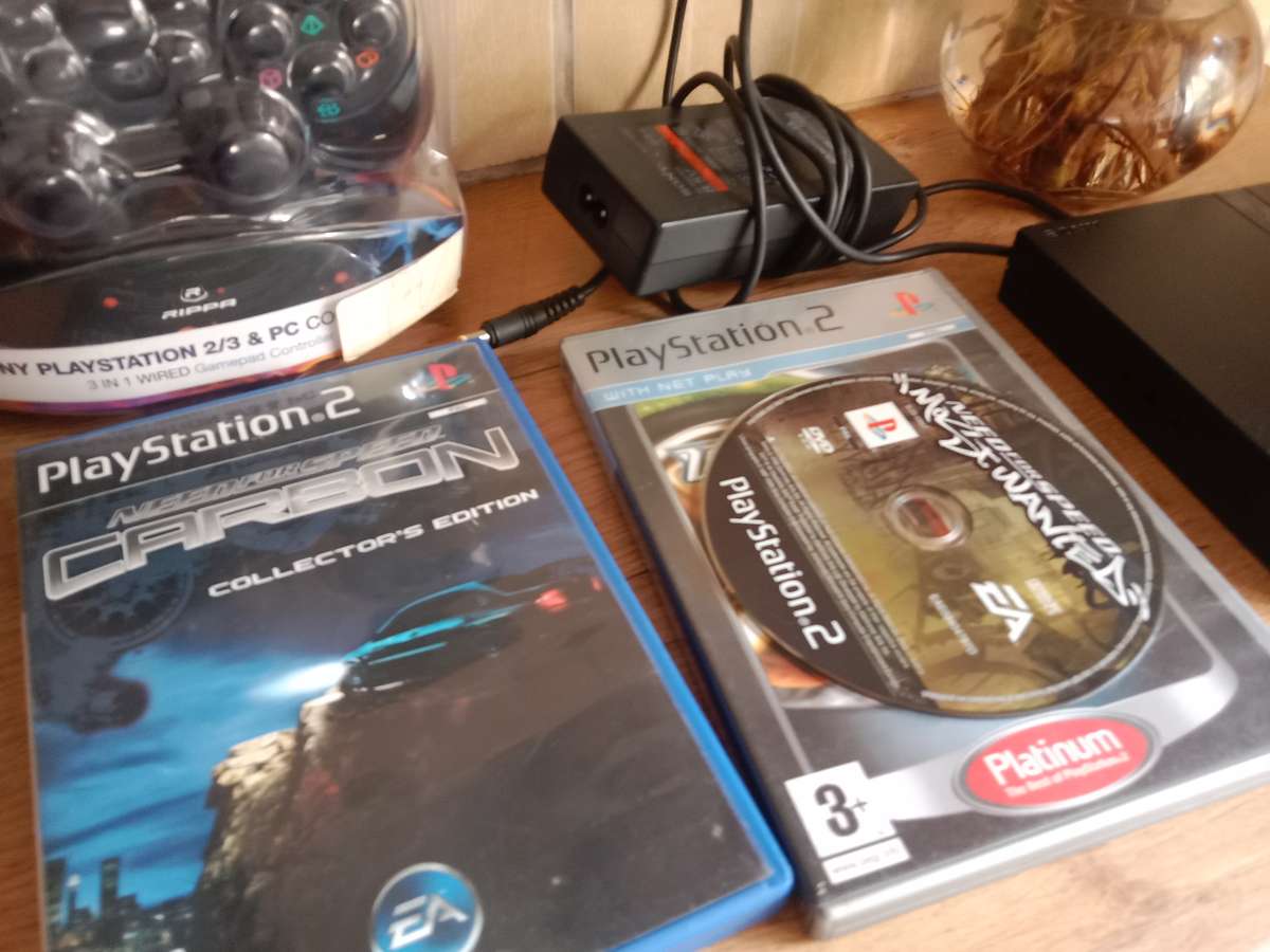 PS2 slim bundle . Needs repair