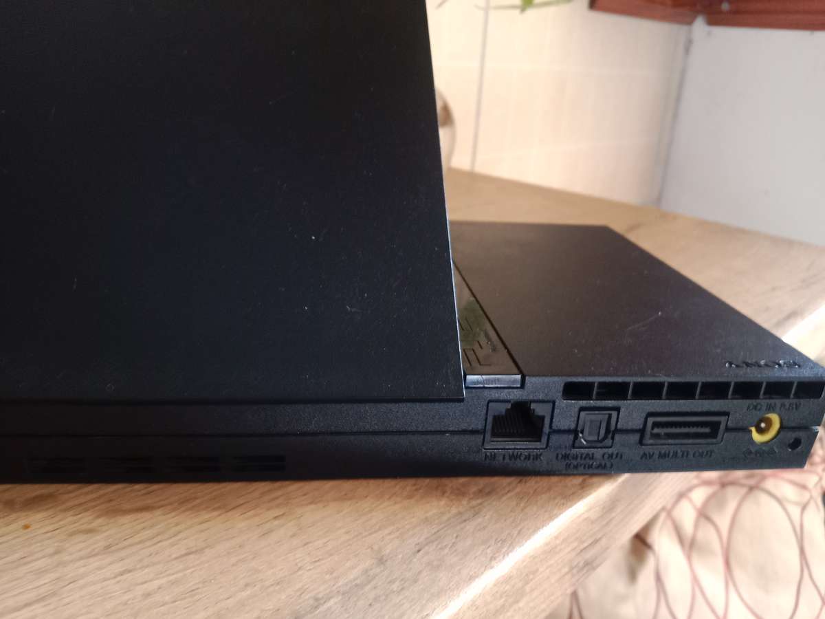 PS2 slim bundle . Needs repair