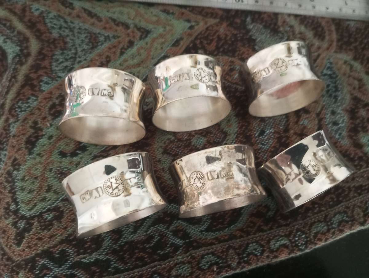 A set of fine silver plated napkin rings