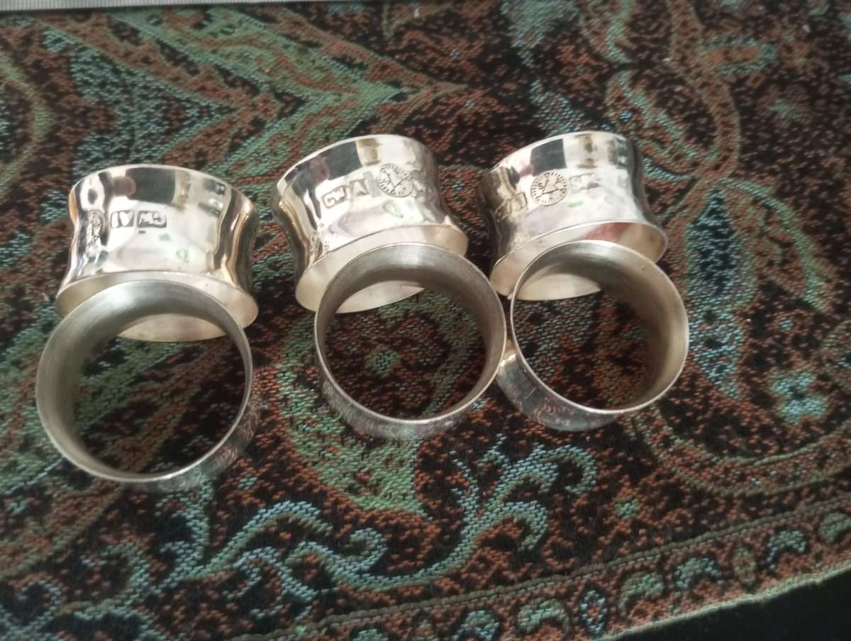 A set of fine silver plated napkin rings