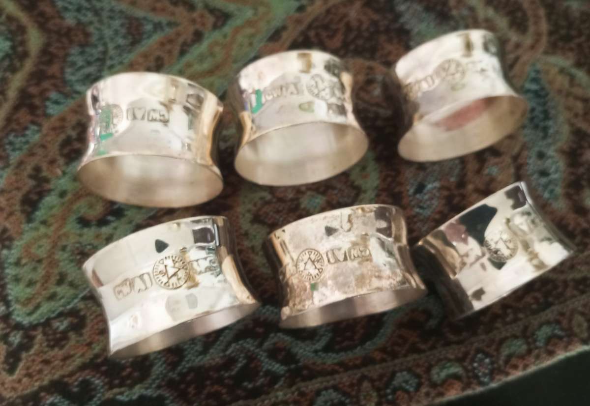 A set of fine silver plated napkin rings