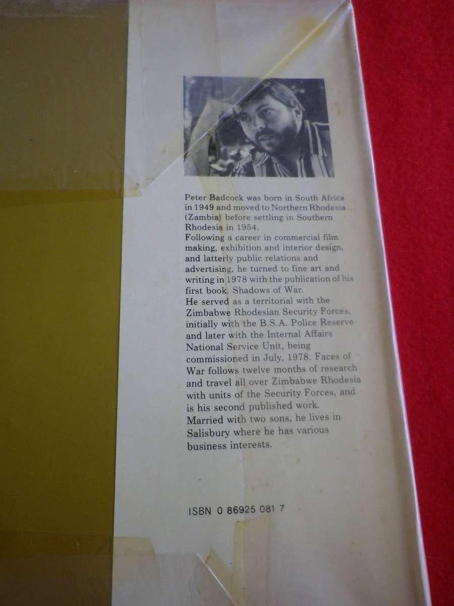 RHODESIAN - "FACES OF WAR" SIGNED BY AUTHOR PETER BADCOCK - HC + PLASTIC COVER OVER WRAPPER  (281)