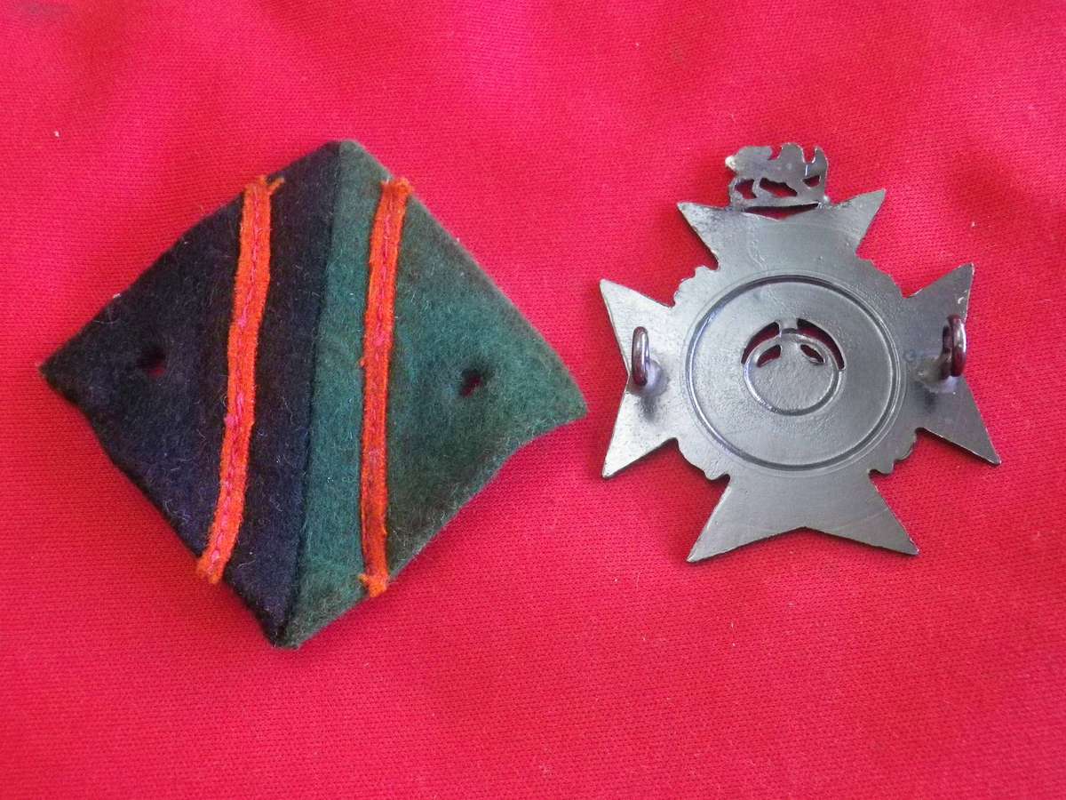 RHODESIA REGT. BLACK ANODISED BERET BADGE + 2BN. FELT BACKING    (5053)