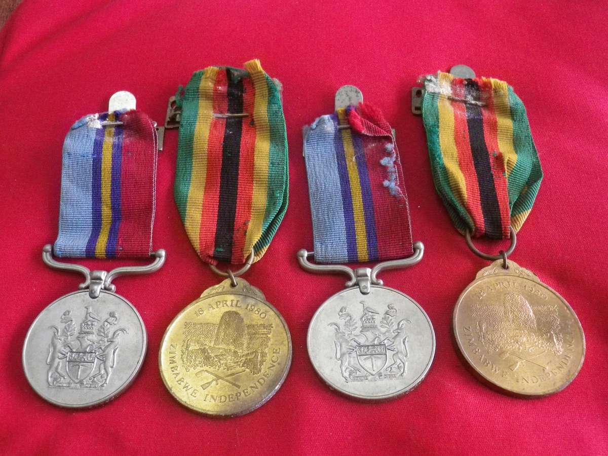 RHODESIA BSAP - GOOD FAMILY GROUP 2 X RH. GSM'S + 2 X ZIM INDEPENDENCE MEDALS - DETAILS BELOW (160)