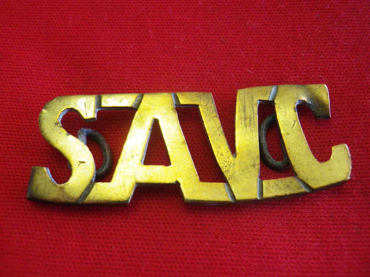 SOUTH AFRICAN VETERINARY CORPS SHEET BRASS SHOULDER TITLE, PROBABLY WW1 - RARE - LUGS BENT  (325)