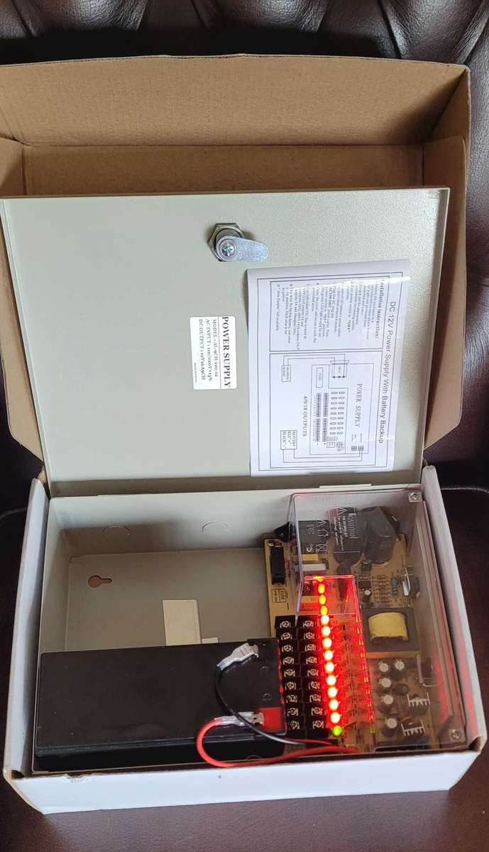 UNUSED 12v Back Up Power Supply. No Key/Screws