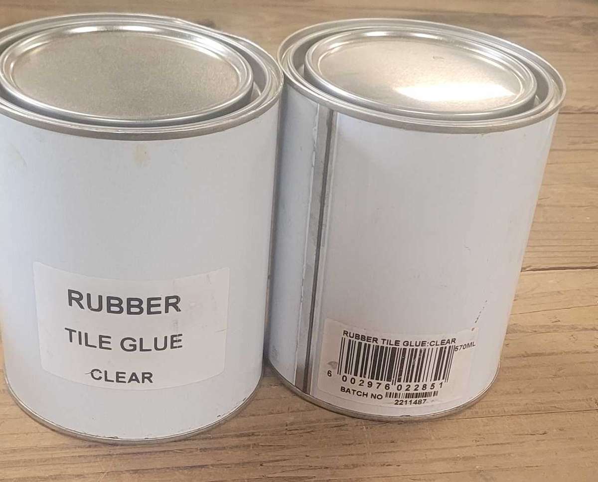 570 ML Clear  Rubber-Tile Glue Tin. (Bid Per Tin)
