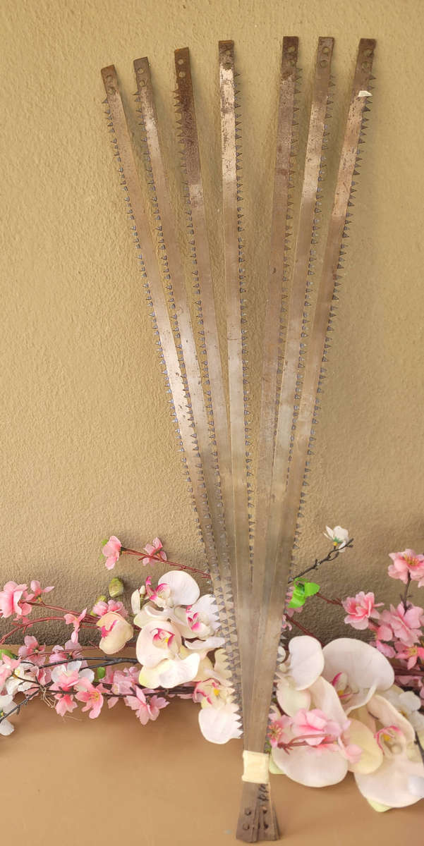 UNUSED... BAND SAW BLADES-With Minor Storage Rust. To be Refilled.  (Bid Per Piece-To Take All 7x)