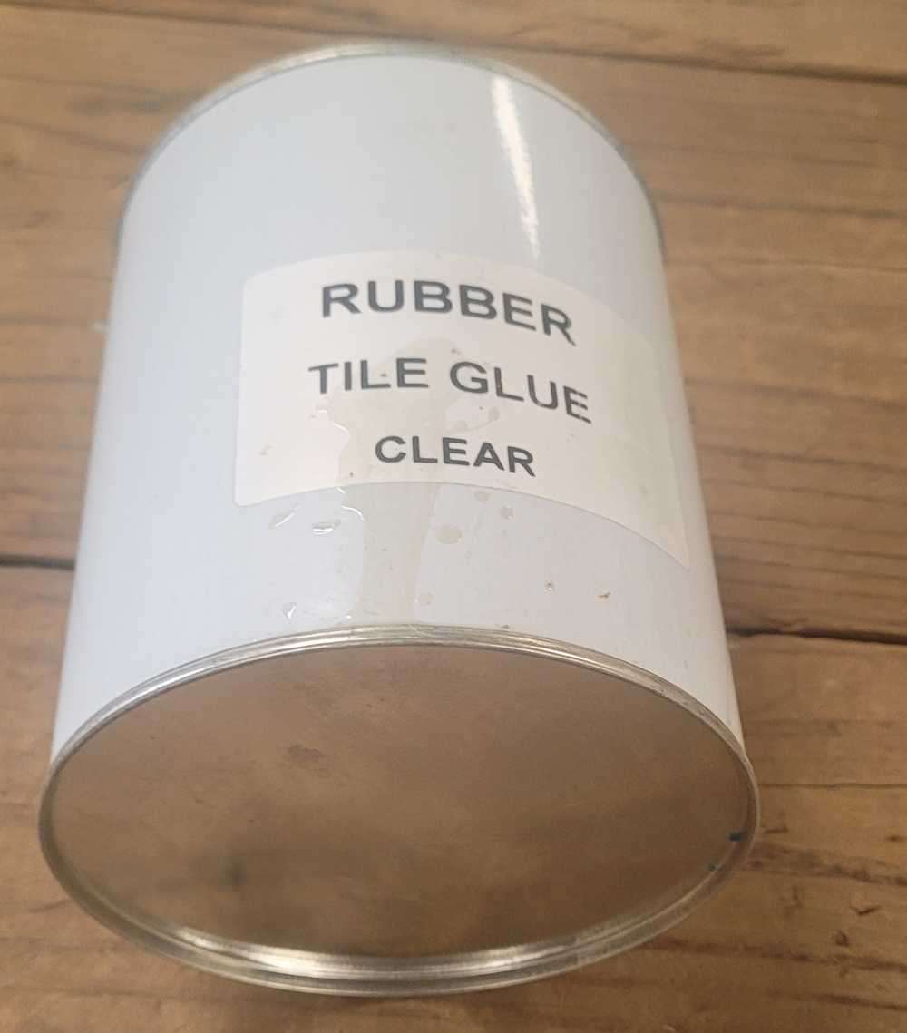 570 ML Clear  Rubber-Tile Glue Tin. (Bid Per Tin)