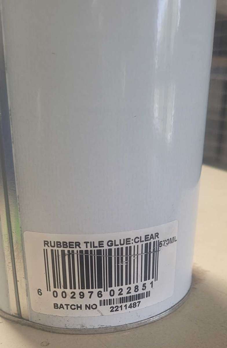 570 ML Clear  Rubber-Tile Glue Tin. (Bid Per Tin)