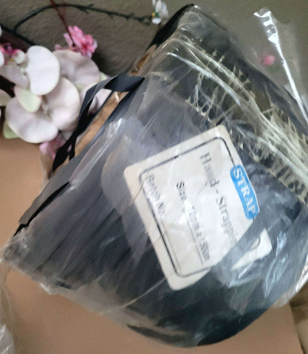 As Used...1500m x 12mm Hand Strapping Roll (In Aging Packaging-As Pictured).