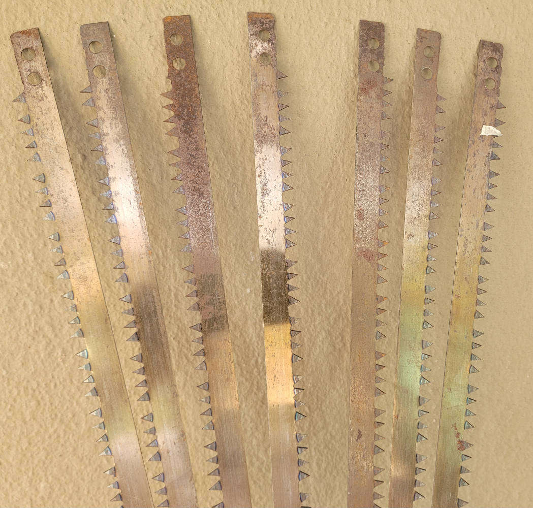 UNUSED... BAND SAW BLADES-With Minor Storage Rust. To be Refilled.  (Bid Per Piece-To Take All 7x)